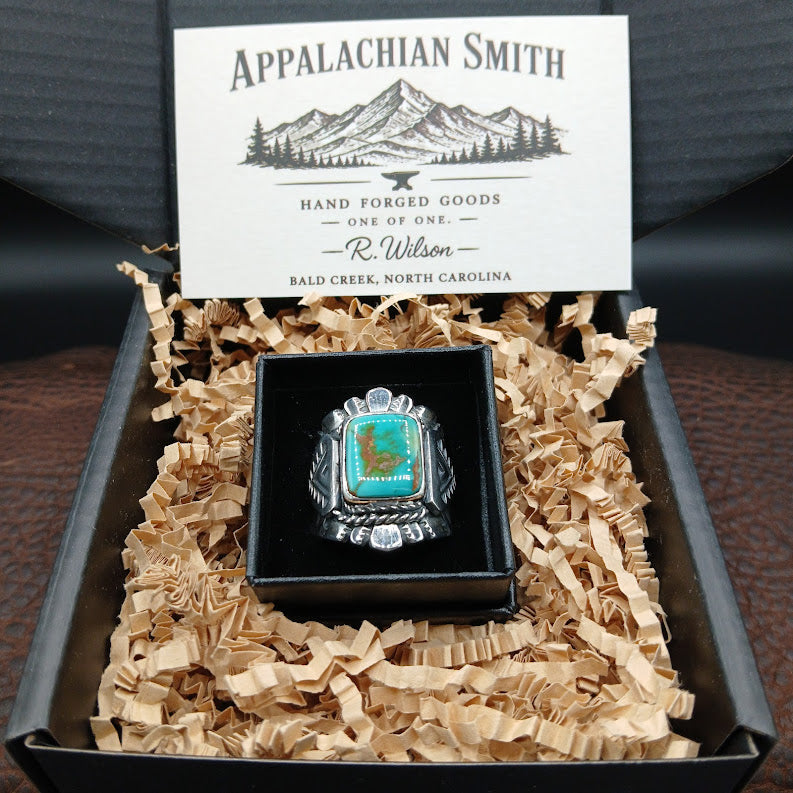 Silver ring with turquoise stone in a box with 'Appalachian Smith' card