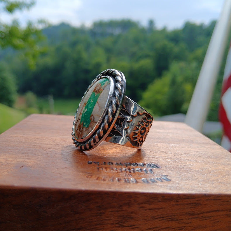 Royston ribbon turquoise ring — side view on cone, stamp detail and twisted rope bezel edge