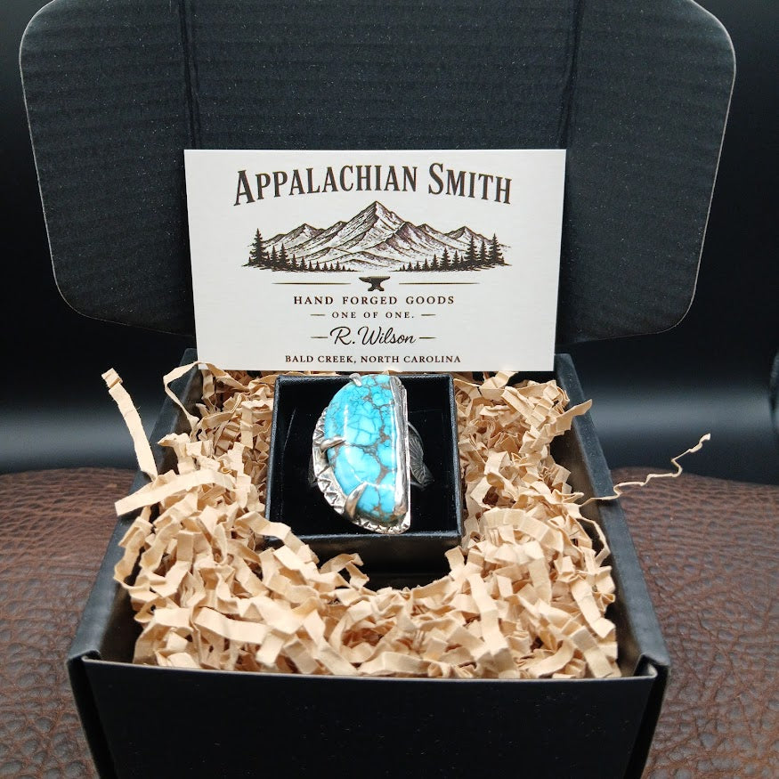 Turquoise ring in a box with 'Appalachian Smith' branding