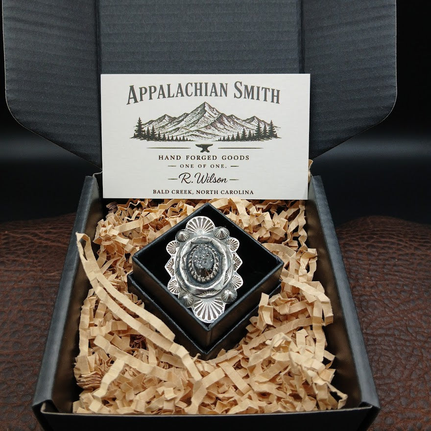 Silver decorative item in a box with 'Appalachian Smith' branding.
