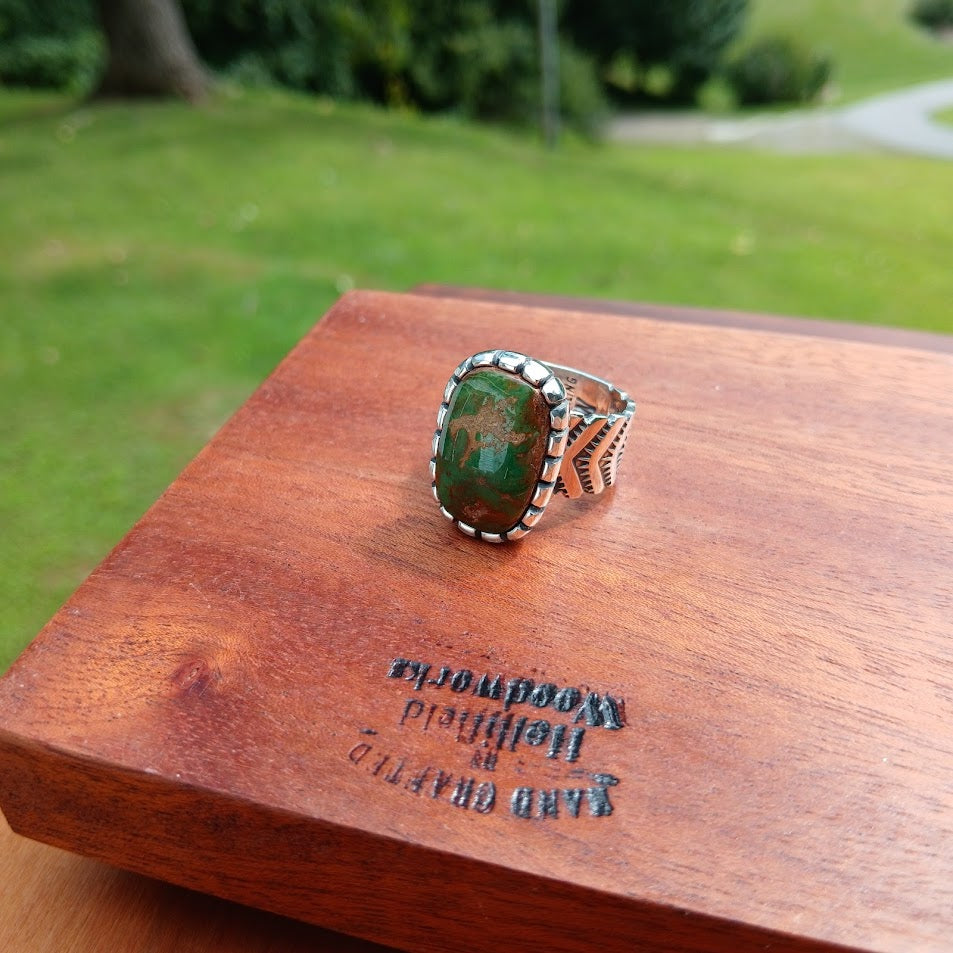 The Camelot — back interior, wood prop, outdoor, castellated bezel from above