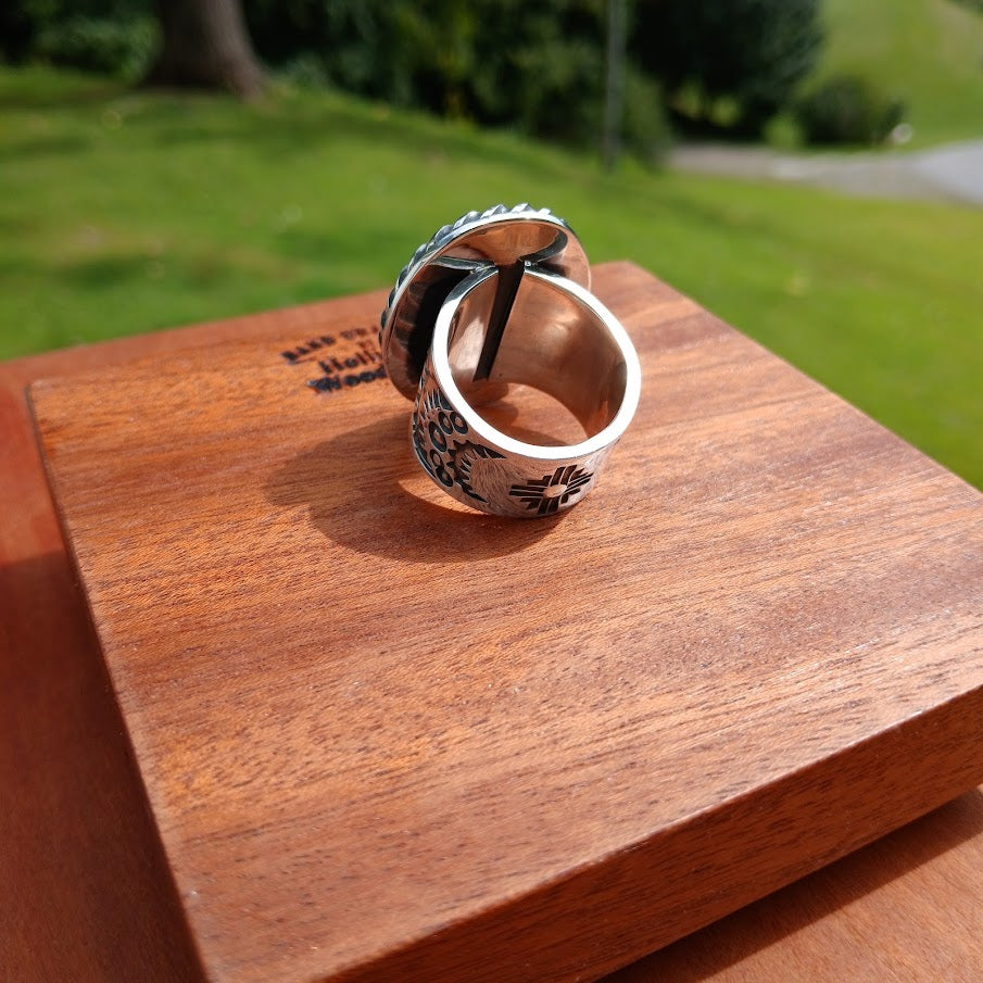 Royston ribbon turquoise ring — stone face, ribbon pattern and twisted rope bezel, black cone