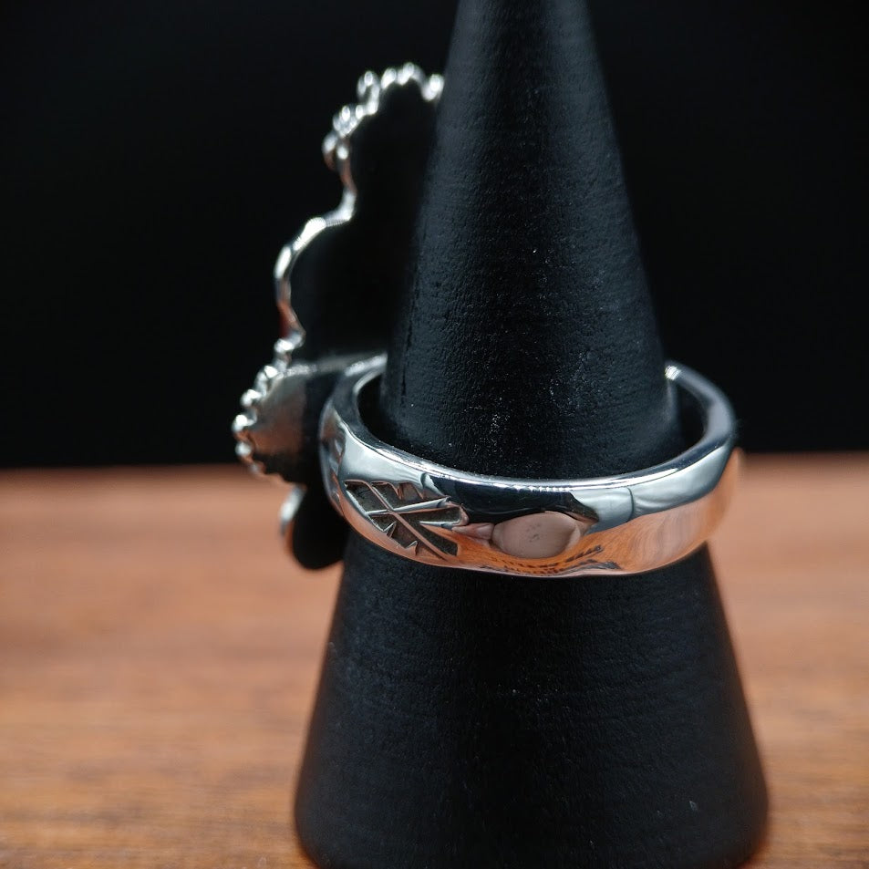 The Ox Cousteau — band profile, black cone, chevron and diamond stamp pattern isolated